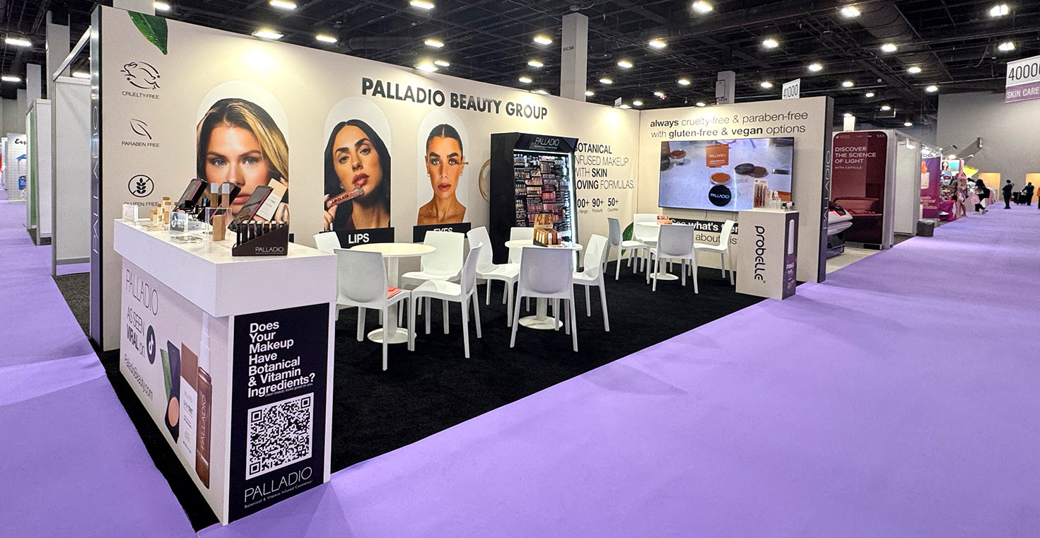 Completed Palladio Beauty Group booth at Cosmoprof North America Las Vegas 2026, showing the finished branded displays, product stations and meeting area.