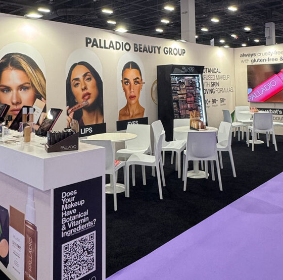 Palladio Beauty Group booth at Cosmoprof North America Las Vegas 2026 featuring makeup displays, meeting areas and branded product visuals.
